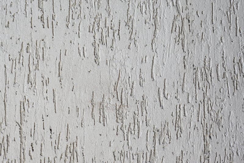 Background plastered wall bark beetle, uneven surface cement gray.  royalty free stock photography